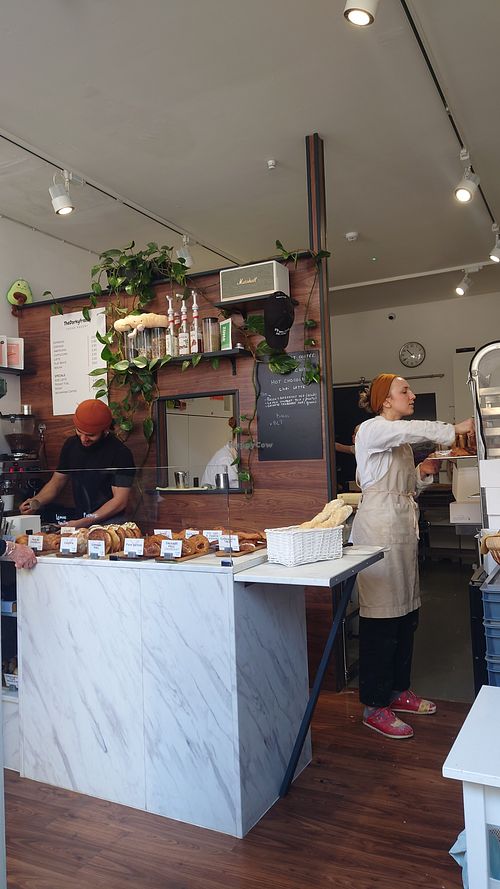 Behind the counter the kitchen with 3 marvellous women doing the food of the gods, thank you at TheDorkyFrench Vegan Bakery in Glasgow