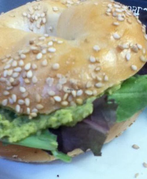 Lime Cilantro Hummus with greens on a Sesame Bagel. at Webster's Cafe in State College
