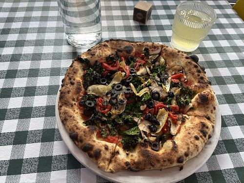 Lyndsey's plant pizza and organic lemonade 😋  at Basic Goodness Pizzeria in Tofino