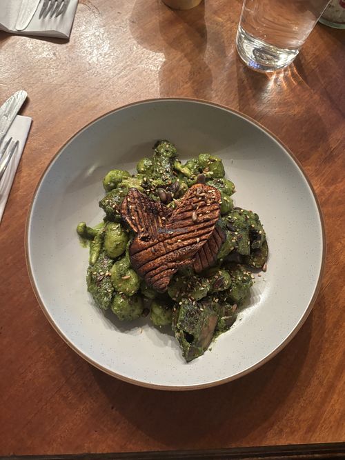 Mixed mushroom gnocchi with cavolo Nero pesto and mixed toasted seeds. My non vegan partner said this was better than his (most expensive) dish!  at The Glenelg Inn in Glenelg