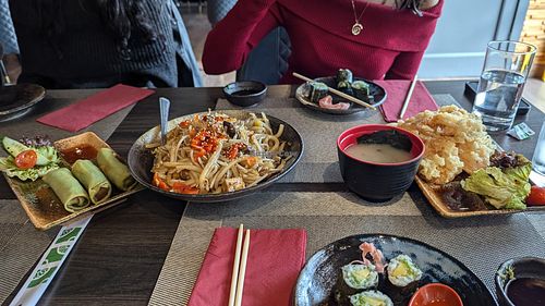 From left to right: vegetable spring rolls, veg and tofu yaki udon, miso soup, vegetable tempura (and avocado maki on the plates). at Hayashi in Leamington Spa