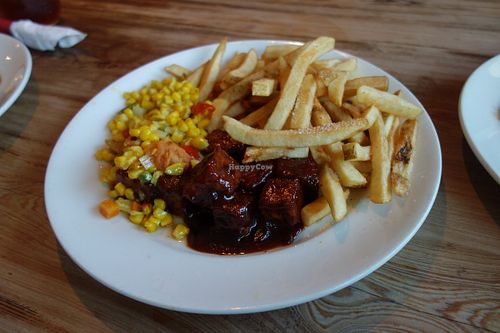 BBQ Tempeh with Corn Succotash and Fries at Southern Charm Kitchen in Gainesville