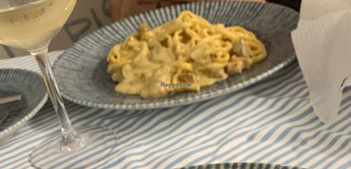 Fettuccine con funghi porcini that should be vegan but it was made with milk at Pesce alla Brace da Fabietto in Fiumicino