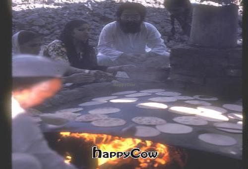 Indian ladies hand made chapaties and cooked them on these griddles day and night to feed over 100,000 people, three meals per day, for 3 days.  at Vegetarian Underground Restaurant in Cypress