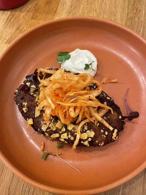 Kale potato steak with kimchi  at botànic in Barcelona