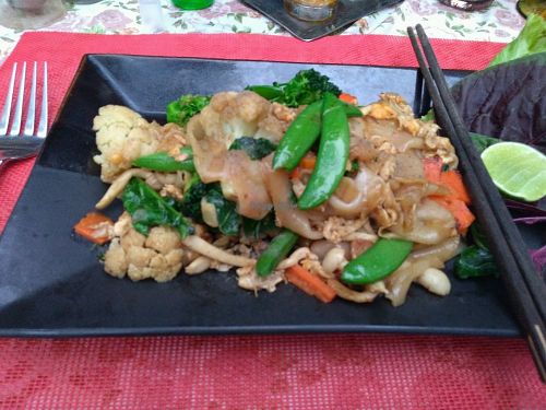 Stir fried noodles with egg, kale, mushrooms and vegetables at Na Aroon in Bangkok