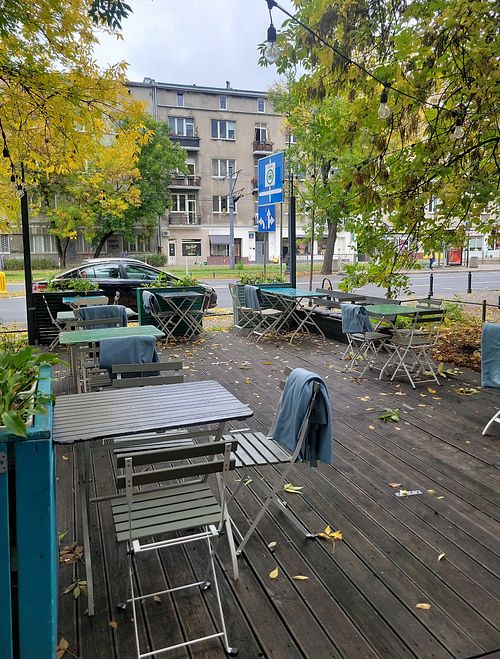 Seating outdoors at Yatta Vegan in Warsaw