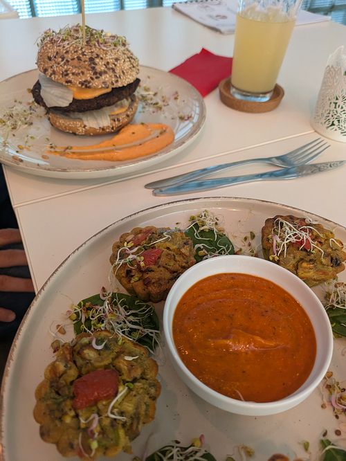 Vegetable muffins and sauce and a burger. Not bad! at Vegasmo in Brasov