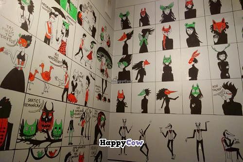 art in the restroom at Taka in Riga