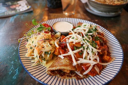 potato pancake with tofu goulash & coleslaw at Vega in Wroclaw