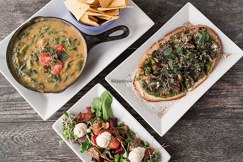 3 appetizers from our dinner menu, spinach, asparagus cheese dip, roasted root veggie (beets, sunchokes, squash) salad w/chive cashew spread, greens on flatbread at Zest Kitchen & Bar in Salt Lake City