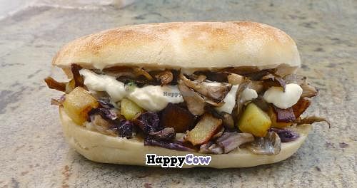 'Vegan Panini 'Shanti': grilled radicchio, roast mushrooms, roast potatoes, vegan cheese, vegan maionese and tabasco at Il Drago in Porto Torres