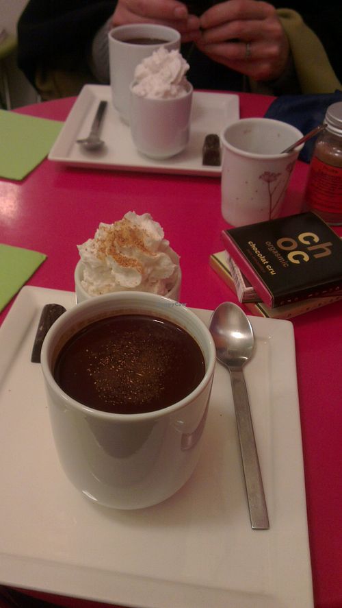 vegan hot chocolate with vegan whipped cream for two at the back of the shop, plus some yummy purchases at ChocoLATITUDES in Paris