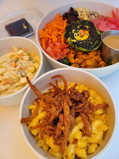 Crusted avocado bowl with 2 sides potato salad and mac n cheese at Hey Sunshine Kitchen in Culver City