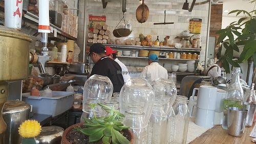 sitting at the bar at The Butcher's Daughter - Nolita in New York City