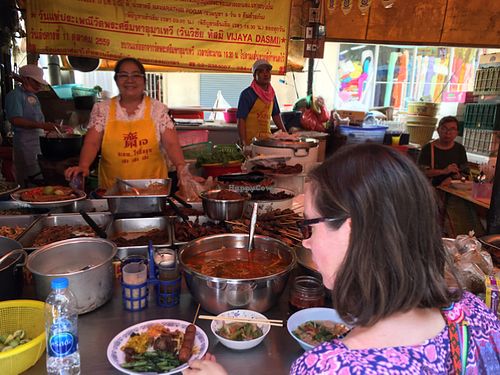 the main chef was so friendly at Vegan Thai Food Stalls in Bangkok