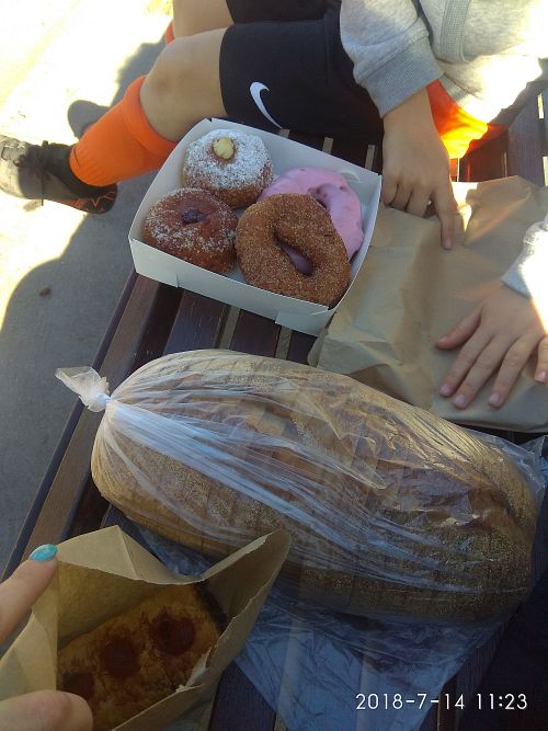 A bit of everything. Pumpkin bread, tofu sausage roll, donuts. at Crumbs Organic Bakehouse in Kensington