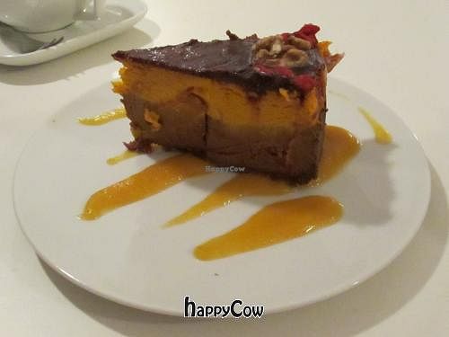 a thick slice of 'cheese' cake made from pumpkin and tofu - delicious! at VEG Deli in Warsaw