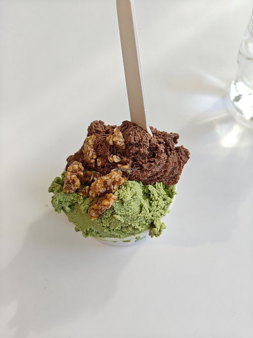 matcha and gianduja gelato with a topping at Gelatoria in Espoo