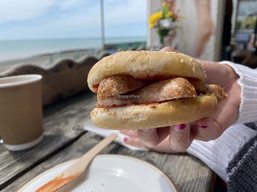 Vegan bap (2 sausages in a brioche bun)  at Whitecliffs Saltdean in Brighton