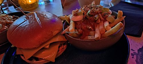 Double burger and fries loaded with katsu sauce and onion at August House in Glasgow