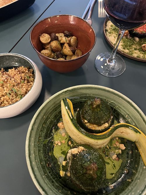 Main and sides (stuffed courgette, bulgar salad and roasted potatoes and mushrooms)  at HEBE  in Paris