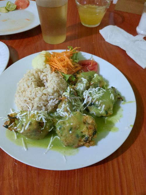 Brown rice, small salad and quinoa veggie meatballs at Dos Girasoles in Lima