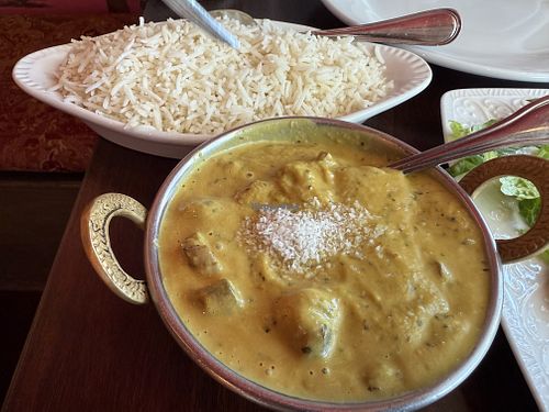 Curry with rice, coconut garnish  at Cafe Lotus in Fairfax