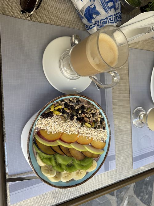Açai bowl with almond milk latte  at Il Posto Skiathos in Skiathos