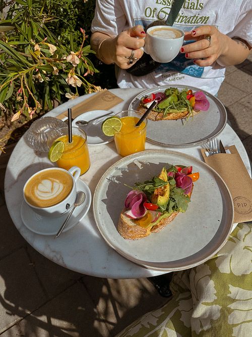 Vegan avocado toast, oat milk cappuccino & fresh orange juice
 at Pip Deli in Haarlem
