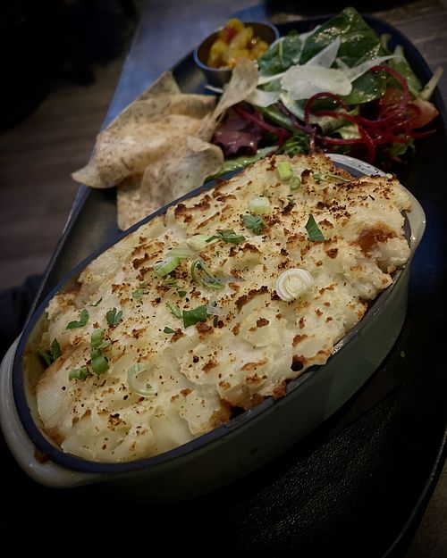 Shepard Pie with pineapple salsa and saladd #Veganuary at The Raven Room in Whistler