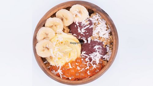 made with organic acai, vegan pineapple sorbet, granola, banana, mango boba, coconut shreds at Menchie's Frozen Yogurt - Arena Blvd in Sacramento