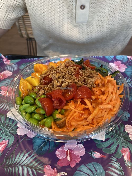 Custom vegan bowl with two different sorts of rice, seitan, tofu, mango, edamame etc.  at Poke Style in Trieste