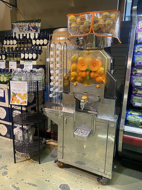 Fresh OJ Machine Near Produce  at Mollie Stone's in San Mateo