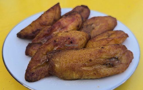 Brodze: "A side of sweet & melt-in-your-mouth fried plantains! Comes with 7 pieces" at Asempe Kitchen in Ithaca