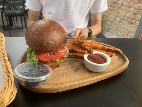 Vegan burger with sweet patatoe fries  at Lokāls Veranda in Jurmala