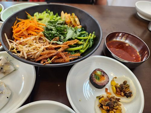 Dinner set menu with refillable banchan. Mixed rice bibimbap at OBOK Veggie - Nhà hàng chay Hàn Quốc  in Hanoi