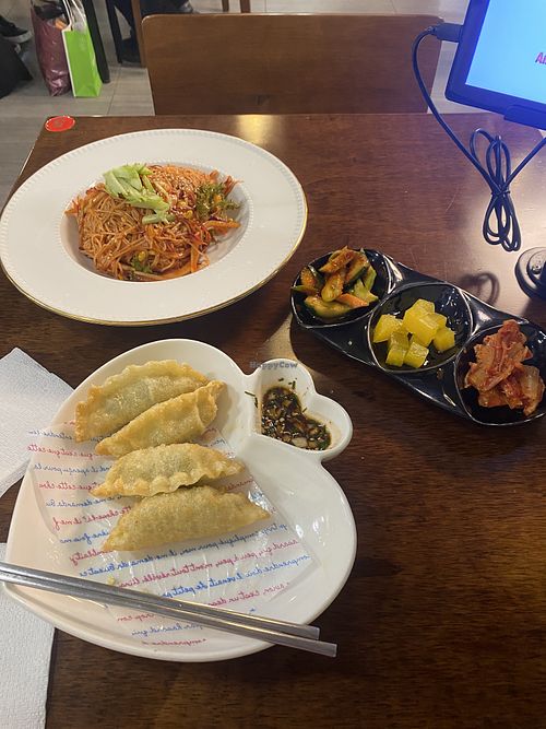 The whole meal (minus one dumpling), with complementary pickles. Enough for leftovers and at a good price point!  at Vegan Kitchen - 비건 키친 in Seoul