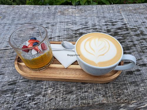 Oat milk latte and mango chia pudding at Panorama Cafe  in Turnov