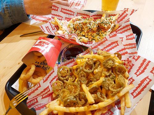 Jalapeño fries, onion rings, and prawn fries in the background #Veganuary at Thunder Vegan - La Latina  in Madrid