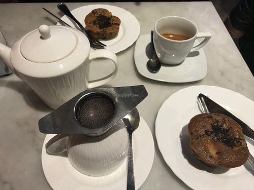 Tea, coffee and apple muffins with chocolate sprinkles at Torteria Olsen in Turin