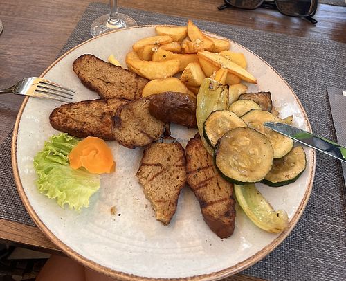 We stopped here for lunch and we all enjoyed it very much. Choice of seitan with potato, veggie burger and more. Large portions and prices commensurate with that. May recommend.  at Pirates Kitchen  in Omis