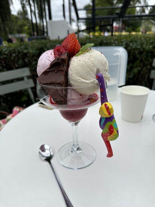 Vegan vanilla and strawberry ice cream with brownie and raspberry sauce (asked to change chocolate ice cream and chocolate sauce).  at Smultronstället in Soederkoeping
