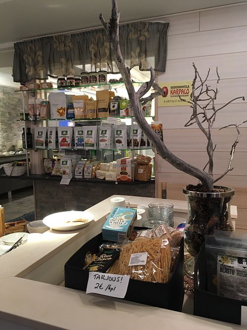 Interior, including a small shop. at Kasvisravintola Karpalo in Kuusamo