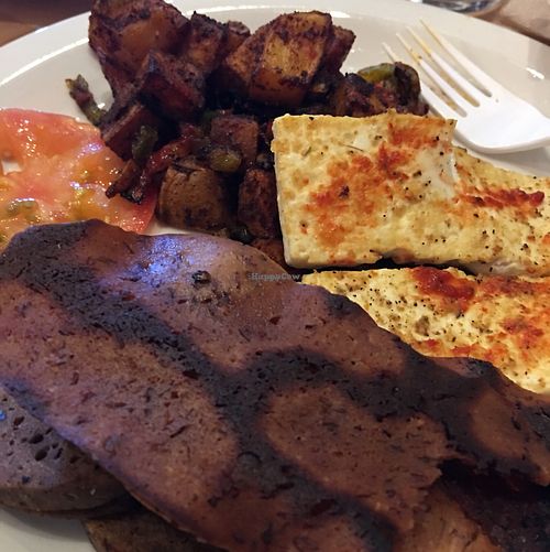 classic ";egg"; dish with tofu, vegan bacon and breakfast potatoes at Mead's Green Door Cafe in Orange