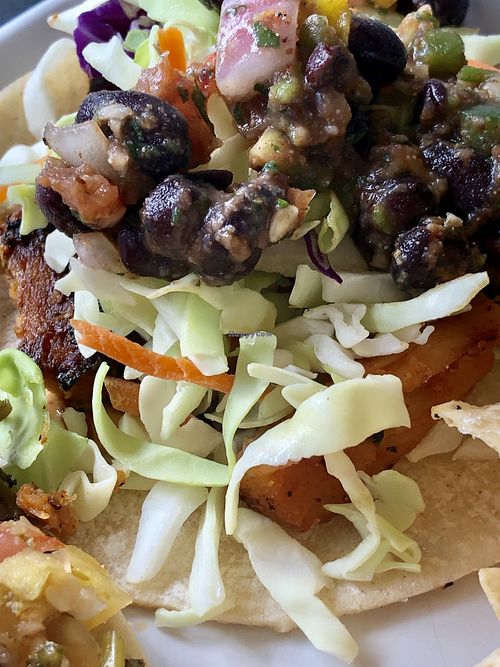 Mock Grilled Chicken Taco... topped with black beans make Tuesdays happy days. at Green Bar and Kitchen in Fort Lauderdale