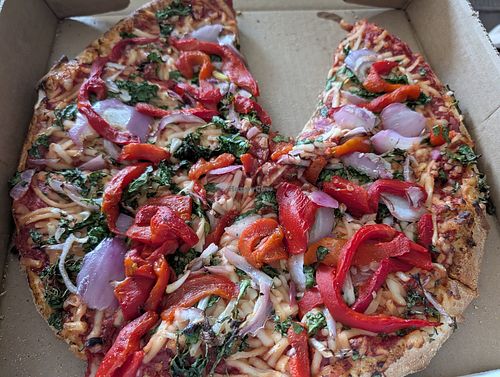 Vegan cheese, onions, peppers, and spinach at Leonardo's Pizza in Burlington