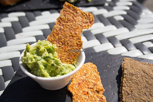 Crackers and guacamole at Nama Artisan Raw Foods in West London