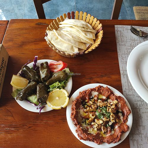 Jalenxhi (stuffed vine leaves) and muhamara at Restorant Arabesque in Tirana