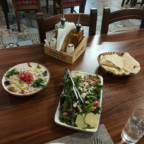 Two dishes served with surprise dairy products that are NOT listed in the menu at Restorant Arabesque in Tirana